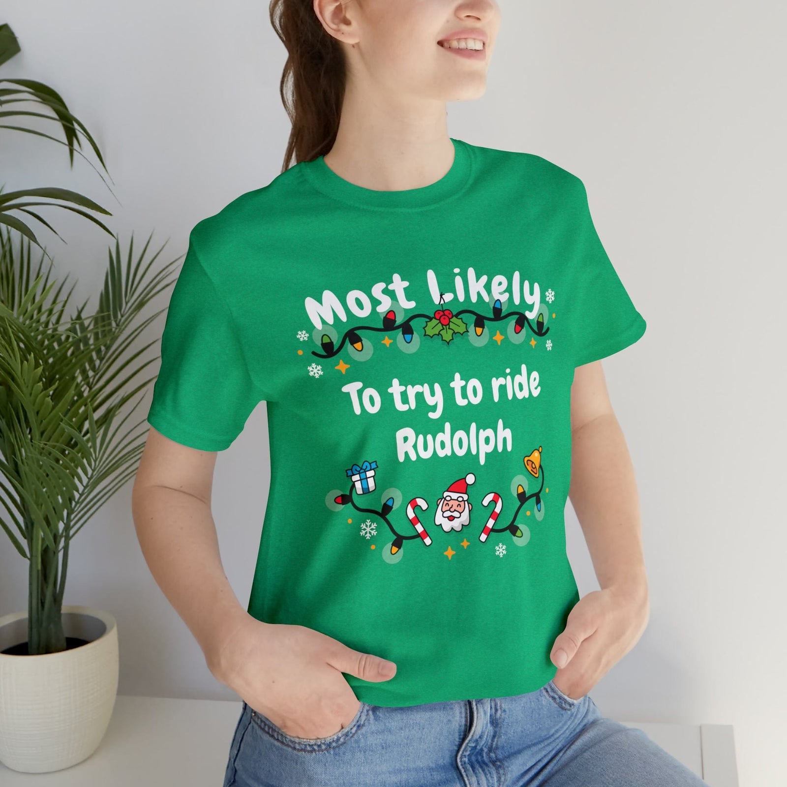 Most Likely To try To Ride Rudolph Unisex Deluxe Tee